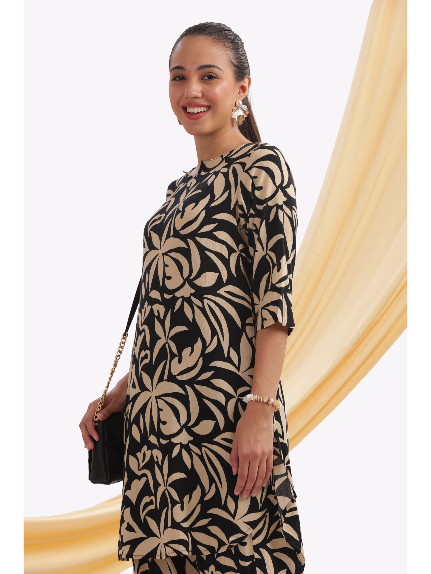 black and beige leaf-patterned punjabi co-ordset