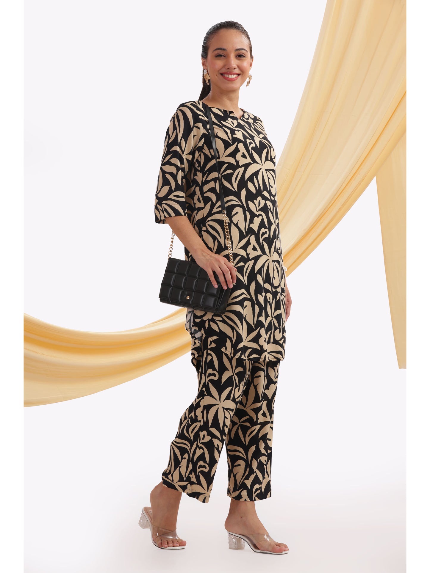black and beige leaf-patterned punjabi co-ordset