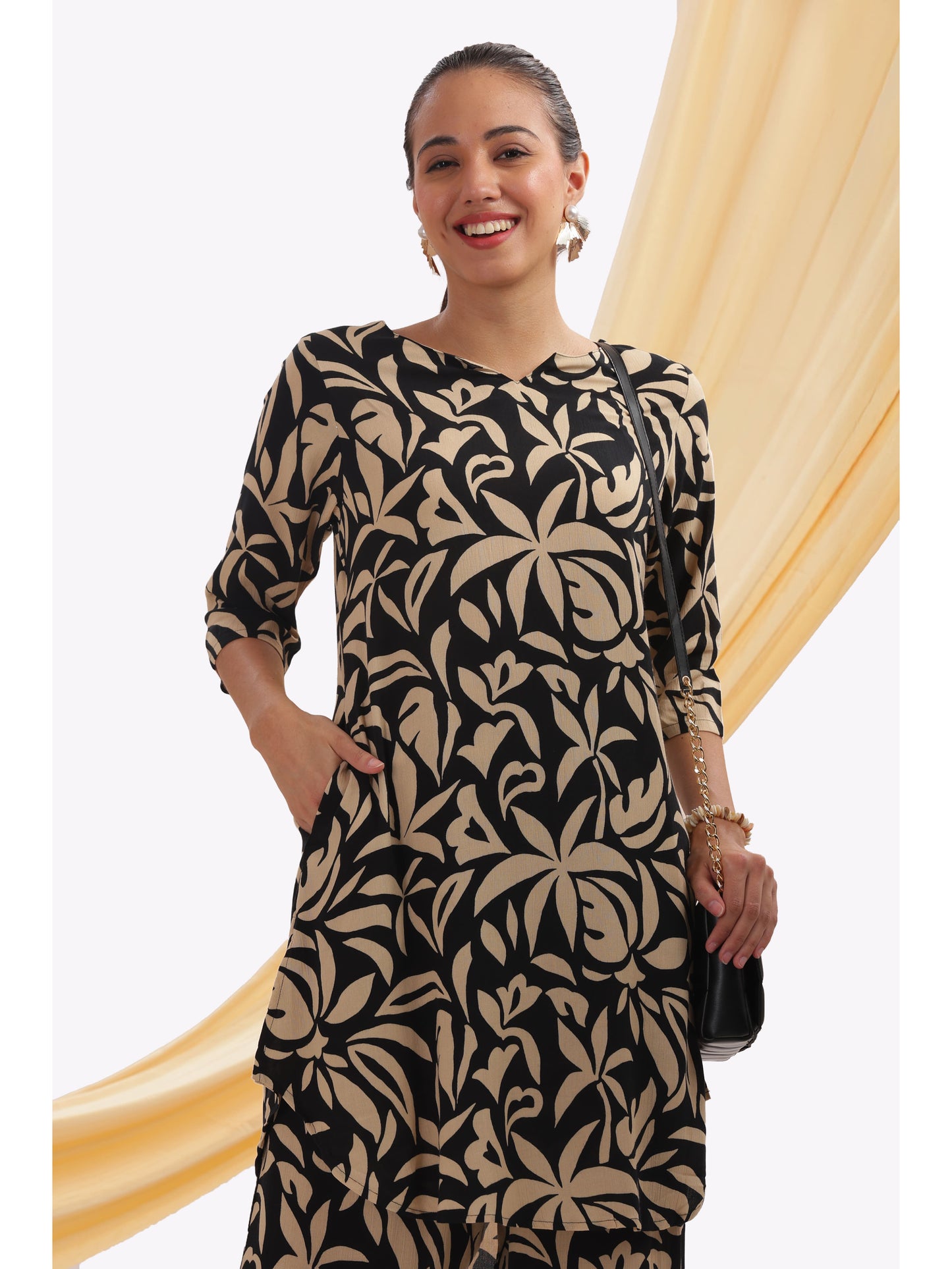 black and beige leaf-patterned punjabi co-ordset